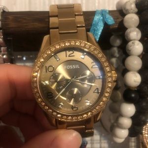 Gold fossil watch